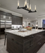 Beau 7 Light 44" Linear Pendant in Bronze in a room setting