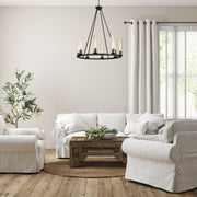 Beau 8 Light 33" Chandelier in Bronze in a room setting