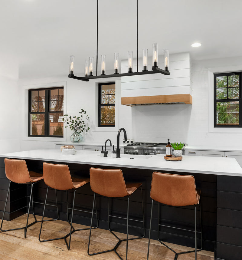 Beau 9 Light 56" Linear Pendant in Bronze in a room setting