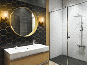 Callista 1 Light 6.5" Wall Sconce, 9" Tall in Rubbed Brass in a room setting
