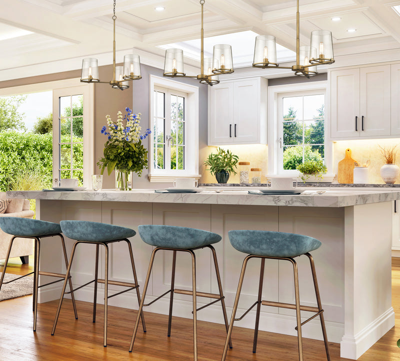 Callista 3 Light 28" Chandelier in Rubbed Brass in a room setting