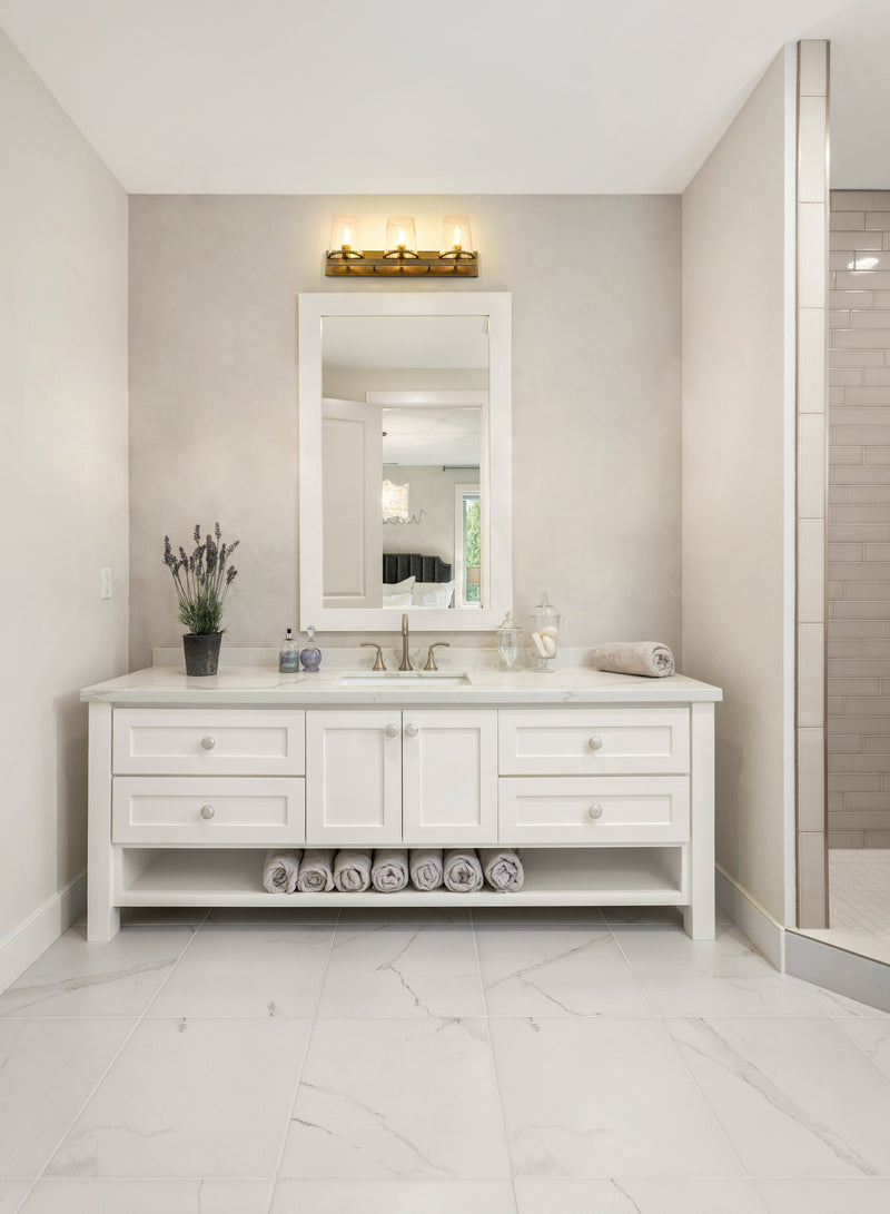 Callista 3 Light 27.5" Vanity in Rubbed Brass in a room setting
