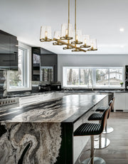 Callista 8 Light 56" Linear Pendant in Rubbed Brass in a room setting