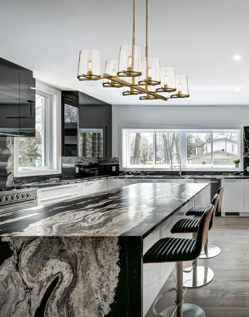 Callista 8 Light 56" Linear Pendant in Rubbed Brass in a room setting