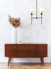 Emily 2 Light 19" Linear Pendant in Matte Black in a room setting