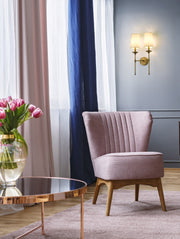 Emily 2 Light 13.75" Wall Sconce in Rubbed Brass in a room setting