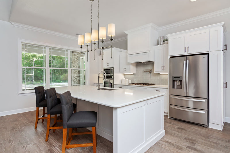 Emily 5 Light 51" Linear Pendant in Polished Nickel in a room setting