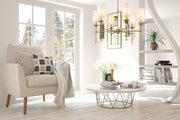 Emily 6 Light 38" Chandelier in Rubbed Brass in a room setting