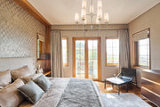 Emily 9 Light 38" Chandelier in Brushed Nickel in a room setting