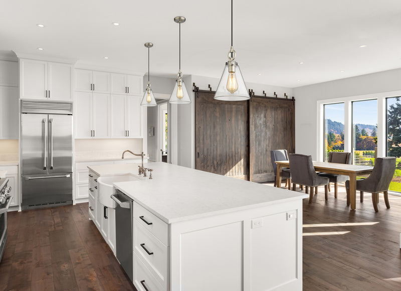 Harper 1 Light 8" Pendant in Brushed Nickel in a room setting