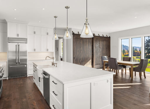Harper 1 Light 8" Pendant in Brushed Nickel in a room setting