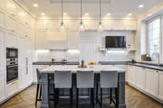 Harper 1 Light 8" Pendant in Polished Nickel in a room setting