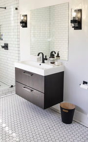 Fontaine 1 Light 4.75" Wall Sconce in Matte Black in a room setting