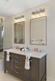 Fontaine 3 Light 24" Vanity in Brushed Nickel in a room setting