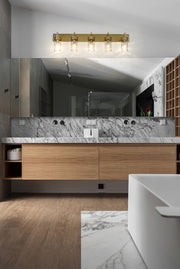 Fontaine 5 Light 44" Vanity in Rubbed Brass in a room setting