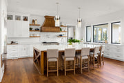 Fontaine 4 Light 13" Pendant in Brushed Nickel in a room setting