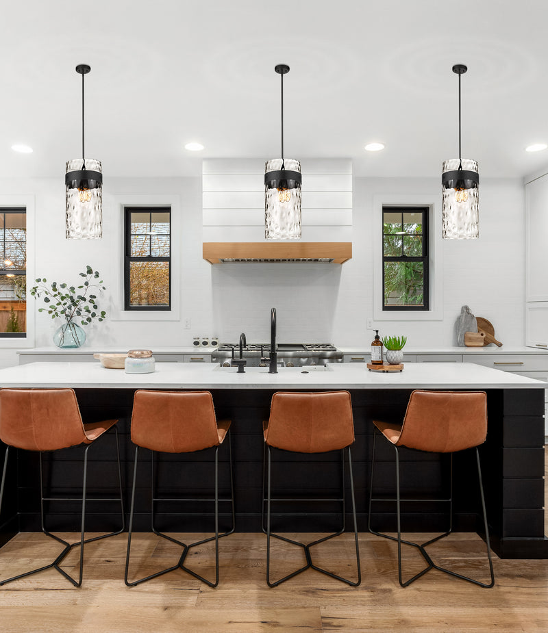 Fontaine 4 Light 13" Pendant in Matte Black in a room setting