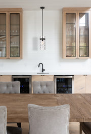 Fontaine 1 Light 6.5" Pendant in Matte Black in a room setting