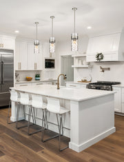 Fontaine 3 Light 9" Pendant in Brushed Nickel in a room setting