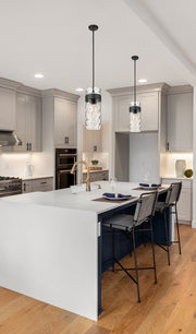 Fontaine 3 Light 9" Pendant in Matte Black in a room setting