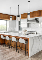 Fontaine 3 Light 9" Pendant in Matte Black in a room setting