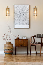 Alverton 1 Light 5.25" Wall Sconce in Rubbed Brass in a room setting