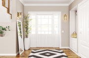 Alverton 1 Light 5.25" Wall Sconce in Rubbed Brass in a room setting