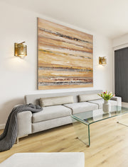 Kipton 1 Light 6" Wall Sconce in Rubbed Brass in a room setting