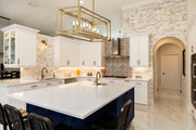 Easton 9 Light 44" Linear Pendant in Rubbed Brass in a room setting