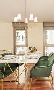 Shannon 5 Light 32" Chandelier in Rubbed Brass in a room setting