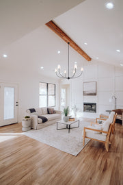 Shannon 6 Light 62" Chandelier in Matte Black in a room setting