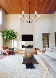 Shannon 6 Light 62" Chandelier in Matte Black in a room setting