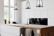 Archis 3 Light 12" Pendant in Matte Black in a room setting