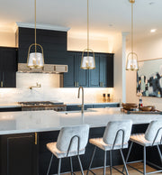 Archis 3 Light 12" Pendant in Modern Gold in a room setting