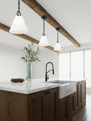 Alaric 1 Light 10" Pendant in Matte Black in a room setting