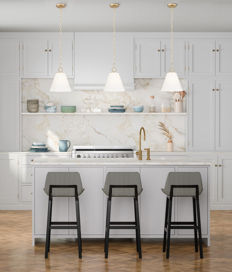 Alaric 1 Light 10" Pendant in Modern Gold in a room setting