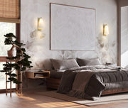 Farrell 1 Light 7.25" Wall Sconce in Modern Gold in a room setting
