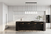 Farrell 7 Light 54" Linear Pendant, 11" Tall in Matte Black in a room setting