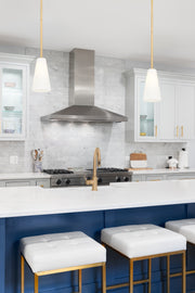 Farrell 1 Light 6" Pendant, Rod Mount in Modern Gold in a room setting