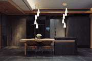 Farrell 5 Light 12" Pendant, 13.75" Tall in Modern Gold in a room setting