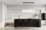 Farrell 7 Light 54" Linear Pendant, 13.75" Tall in Matte Black in a room setting