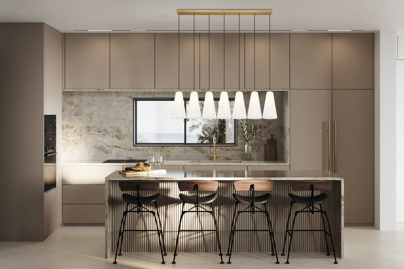 Farrell 7 Light 54" Linear Pendant, 13.75" Tall in Modern Gold in a room setting