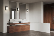 Danica 1 Light 4.75" Wall Sconce in Matte Black in a room setting