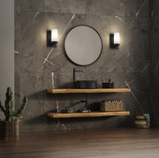 Danica 1 Light 4.75" Wall Sconce in Matte Black in a room setting