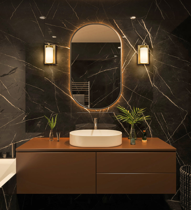 Danica 1 Light 4.75" Wall Sconce in Modern Gold in a room setting