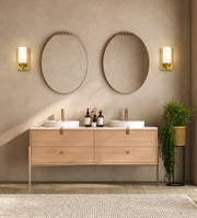 Danica 1 Light 4.75" Wall Sconce in Modern Gold in a room setting