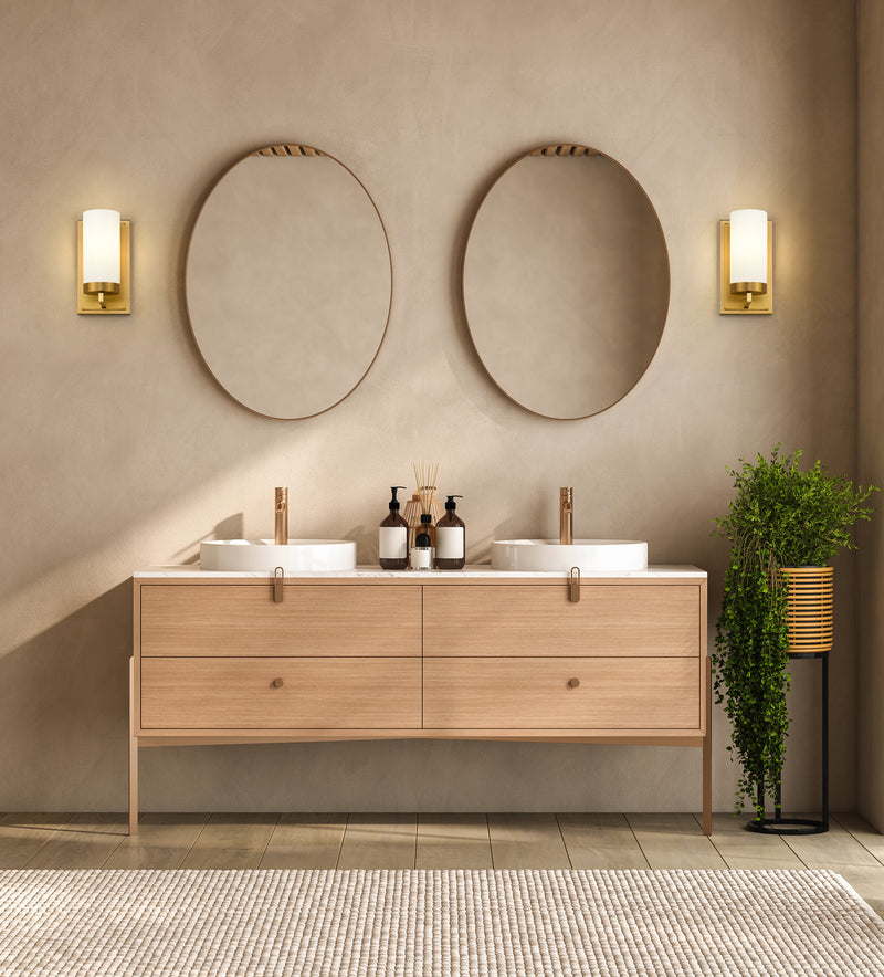 Danica 1 Light 4.75" Wall Sconce in Modern Gold in a room setting
