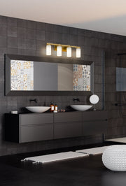 Danica 4 Light 29.5" Vanity in Modern Gold in a room setting