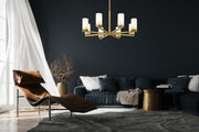 Danica 8 Light 31.5" Chandelier in Modern Gold in a room setting