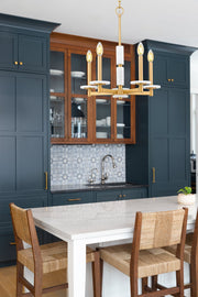 Kaden 5 Light 18" Chandelier in Modern Gold in a room setting